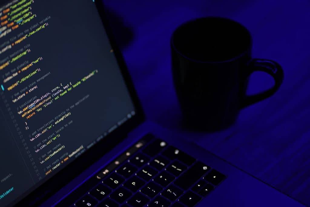 coding on laptop